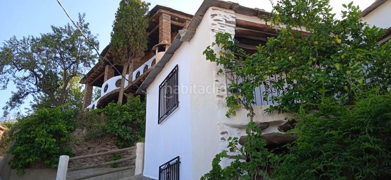 Foto 112b5c5e-c4a2-4d34-981e-e9b414b230b1. Casa adosada en calle sierpe 1 en Nevada