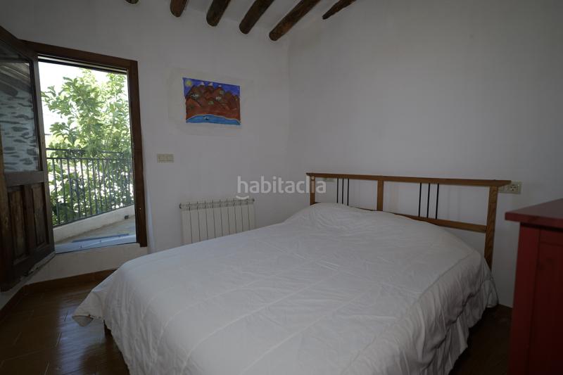 Foto f2bacf2c-b75f-4bf0-9578-289f9c15a286. Casa adosada en calle sierpe 1 en Nevada