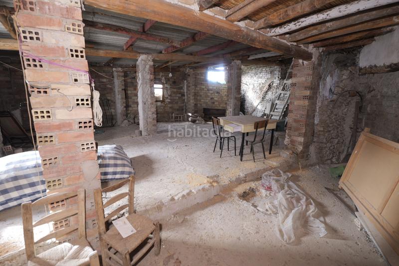 Foto 338413f0-aefd-4a4e-a07b-2c650b1ed289. Casa adosada en calle naranjos 10 en Válor