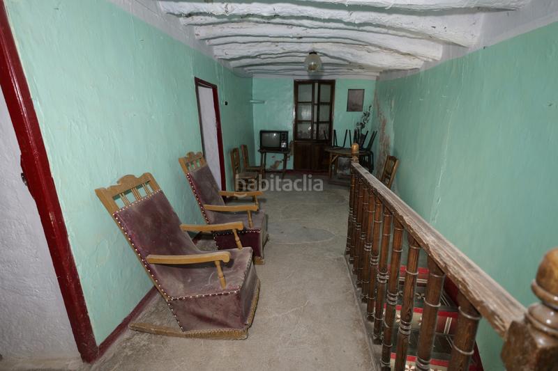 Foto 3ef00da2-177f-42ea-bbb3-42d980726a24. Casa adosada en calle naranjos 10 en Válor