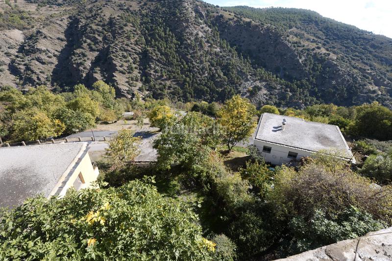 Foto 5215f1ef-3b89-4f8b-b641-94d9b70d796b. Casa adossada a plaza obispo m peinado 5 a Bérchules