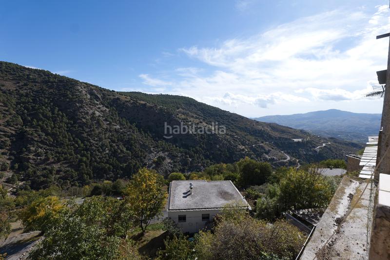 Foto 6f89fd95-cd36-4738-bc1b-a9f15f9709b5. Casa adossada a plaza obispo m peinado 5 a Bérchules