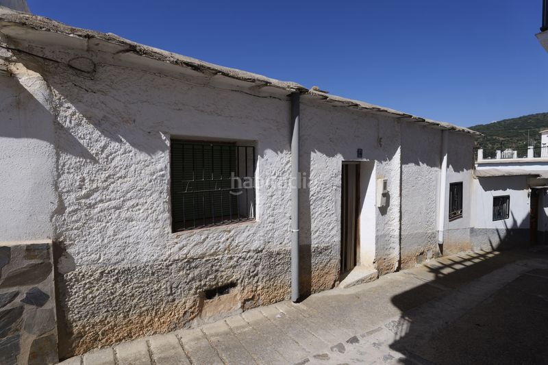 Foto 5888c601-d7dd-4ab6-81c1-6ed0f015f544. Casa adossada a calle capitana 9 a Nevada