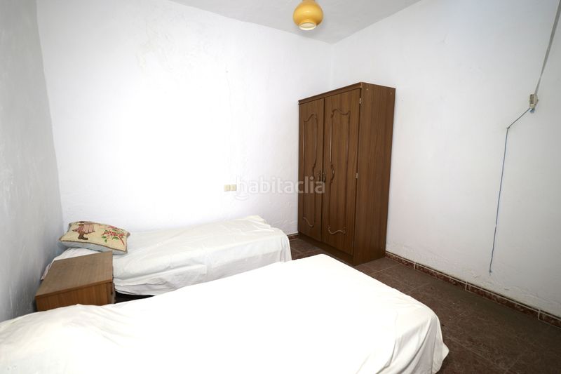 Foto a7a368d6-71b7-4816-86b5-f25facca0d97. Casa adossada a calle capitana 9 a Nevada