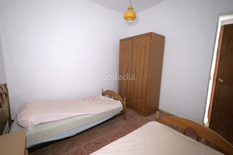 Foto ee32bb3a-3821-4b42-8826-f197eeefe543. Casa adossada a calle capitana 9 a Nevada