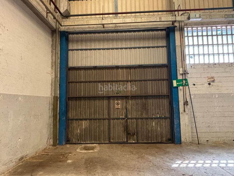 Foto 0f8a4f41-8b24-40b5-9590-ae0e9397931f. Fabrikhalle in Mallabia