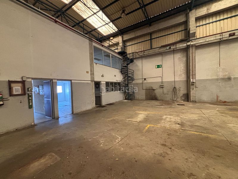 Foto c1d2a6f5-23fc-412a-ba1d-4f6ee94d53ed. Fabrikhalle in Mallabia