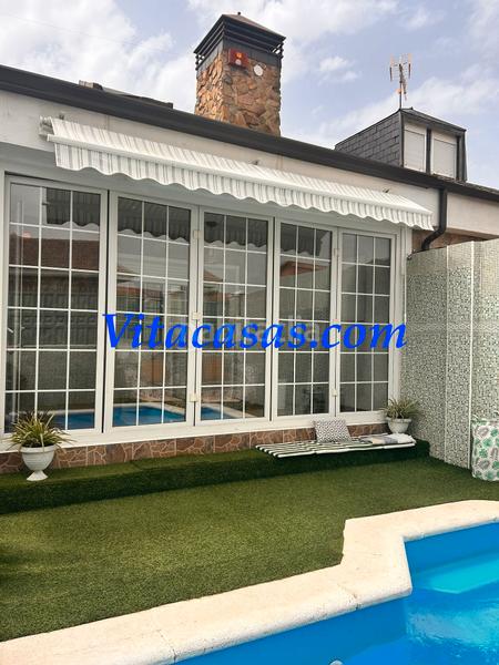 Foto b29126c7-adb6-4053-b198-705fa7bf0c92. Maison jumelée avec cheminée chauffage parking piscine dans San Martín de la Vega