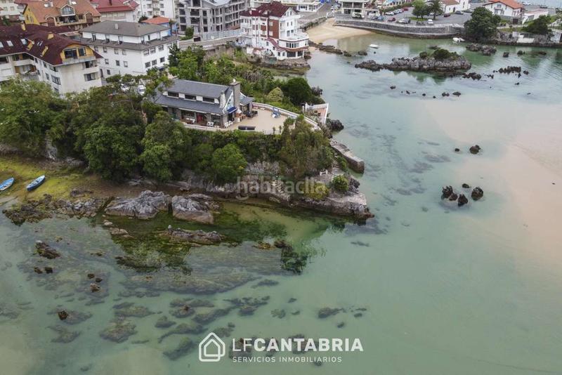 Foto 764fa0fd-ac8e-421e-9f6e-71d3876c1be2. Chalet casa encima del mar en isla en Arnuero