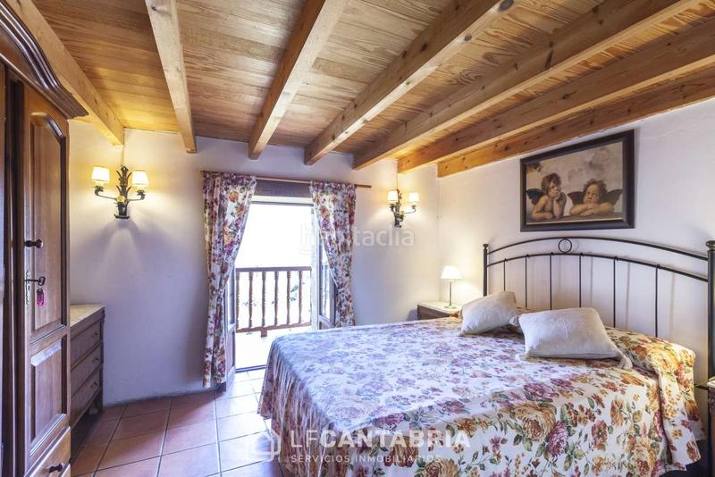 Foto 051a2c2f-3fe2-4a94-8583-b1f1ddd93361. Casa  montañesa en el pueblo en Miera