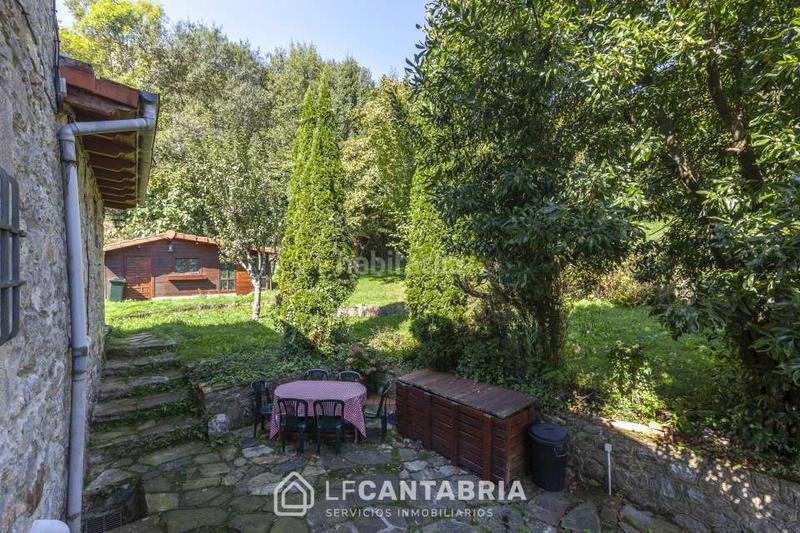 Foto 2a6d3ac6-18dd-4694-bad7-a78ae1f4292c. Casa  montañesa en el pueblo en Miera