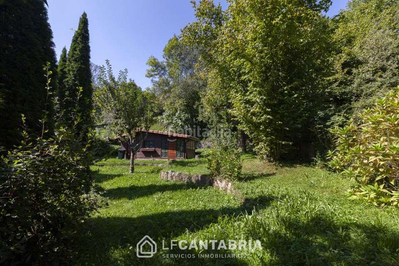 Foto 47bf56cf-2621-4c60-8529-91ff021aae57. Casa  montañesa en el pueblo en Miera