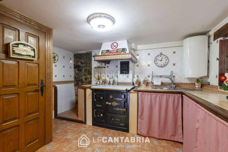Foto d7f032dd-fcda-453b-8992-6f2f276d1eda. Casa  montañesa en el pueblo en Miera
