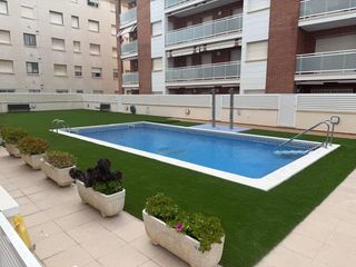 Lloguer Pis  Cossetania. Planta baja con terraza y piscina en primera línea  calafell
