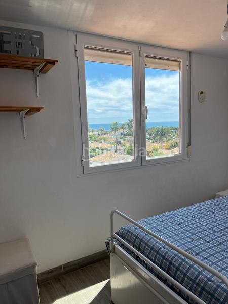 Foto 2524e91c-b540-48ac-8acf-96ffea55c726. Dúplex  en venta con 4 dormitorios, 2 baños y vistas al mar. disfruta de piscina comunitaria en un edificio en buen estado. tu hoga en Mijas