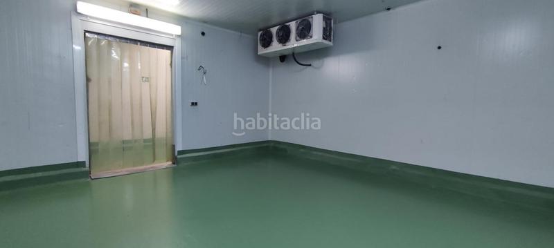 Foto 5693a96c-0c7b-4eb1-99e5-bfa5201e0cf8. Fabrikhalle in Algemesí