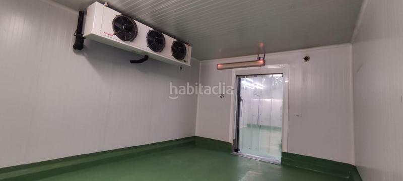 Foto b5a28882-72f9-4af4-8dcd-29337d6ff886. Fabrikhalle in Algemesí