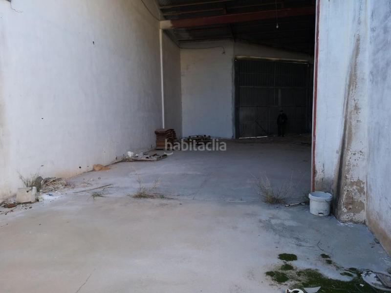 Foto b8019c87-4be4-41c4-b4c8-74ba17ffb7cb. Bâtiment à usage industriel dans calle quart 11 dans Manises