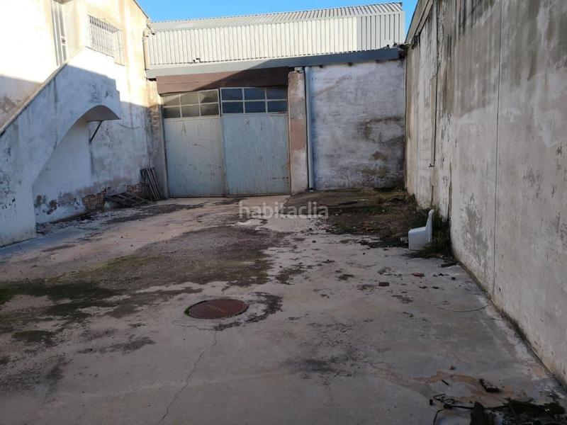 Foto 17819a74-bb10-41b4-bb13-4780c6de48d8. Rent industrial building in calle quart 11 in Polígono del Aeropuerto Manises