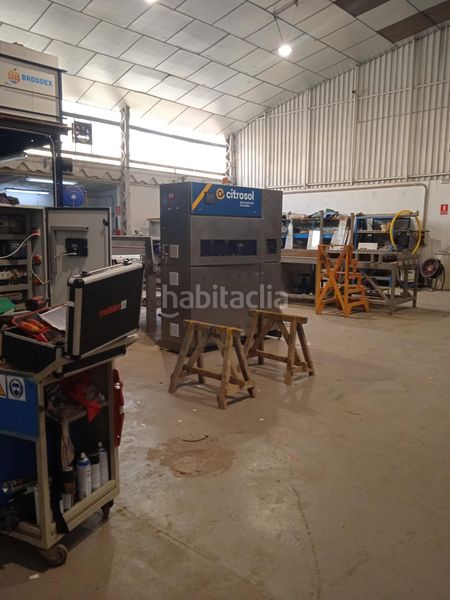 Foto c83ad1a2-f35a-46d4-a1a5-91fe91c1c75b. Nau industrial a Beniparrell