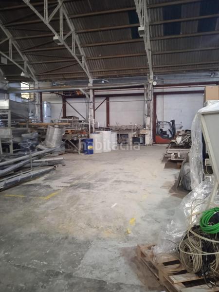 Foto a5162b79-93fc-41f4-ab48-47cca6b4ac76. Bâtiment à usage industriel dans Beniparrell