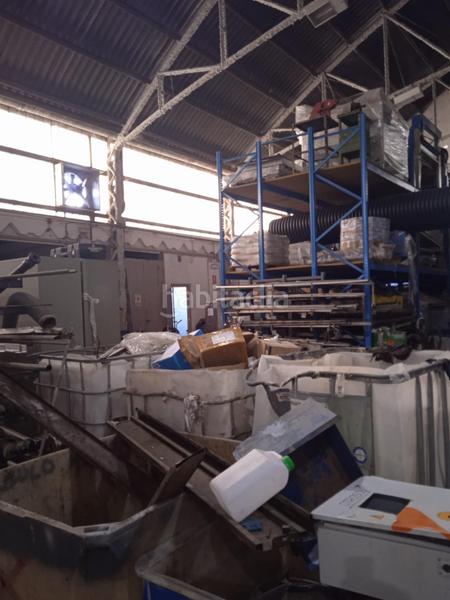 Foto c221a2ab-01dc-444d-815f-79bf98f01602. Bâtiment à usage industriel dans Beniparrell