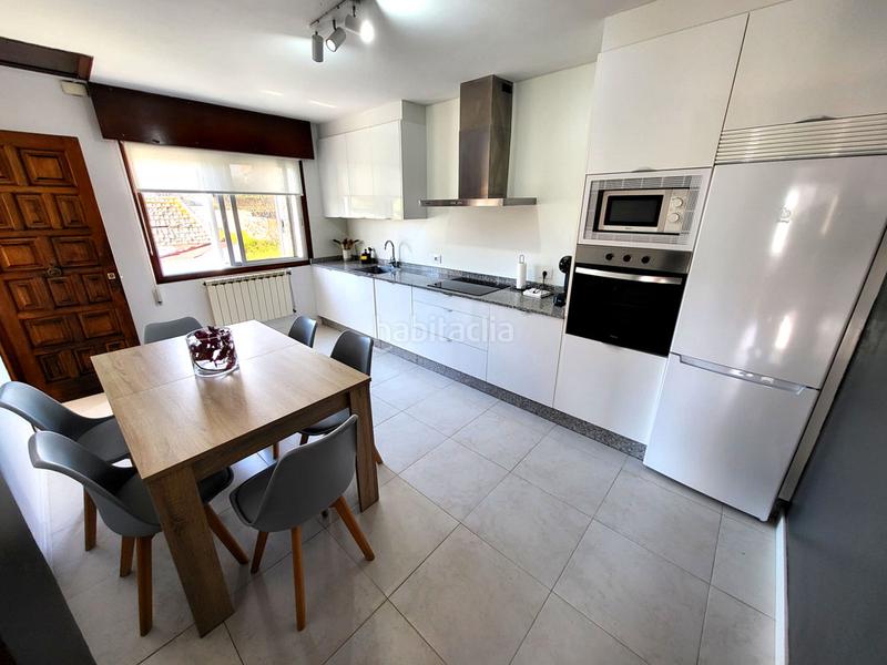 Foto 2775861e-968c-4ffd-b3af-11a9767bb6a4. Maison avec chauffage parking dans Navia Vigo