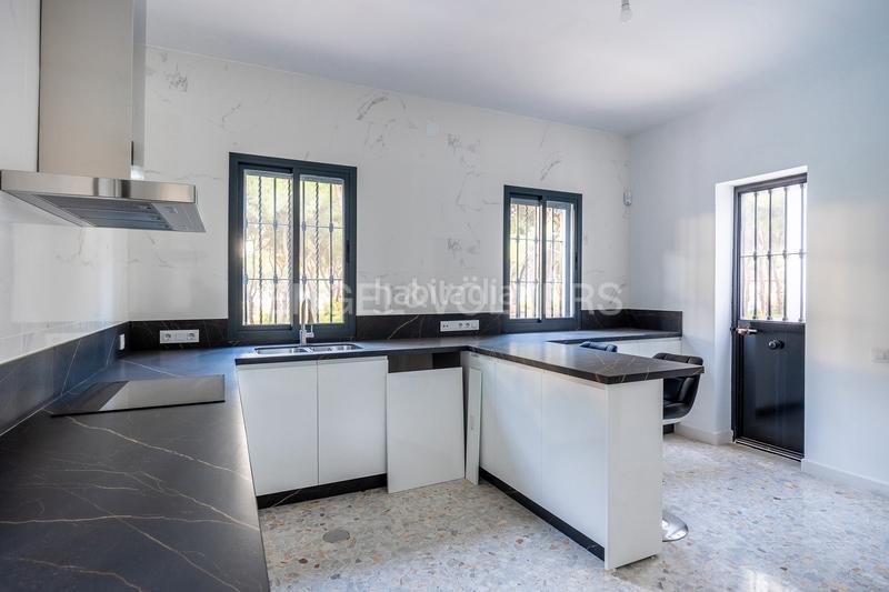 Foto 400a8981-4347-44cc-bf30-f852e7aebc7e. Casa amb calefacció piscina a Oromana Alcalá de Guadaira