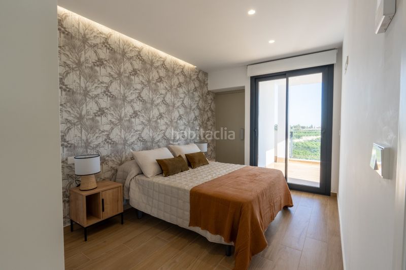 Foto aec4ee31-ca0d-4139-8884-186a07ce69bc. Casa adosada en Algorfa