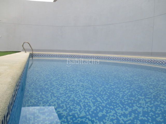 Foto a476268d-11e0-4d38-9a9d-585bfbe9901d. Xalet amb xemeneia piscina a El Faro Cullera