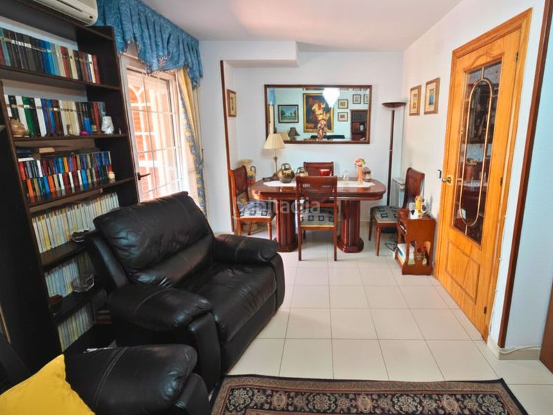 Foto d6c4363d-8458-45ed-b6ee-b9d253135110. Casa adossada amb calefacció aparcament a Las Américas Parla