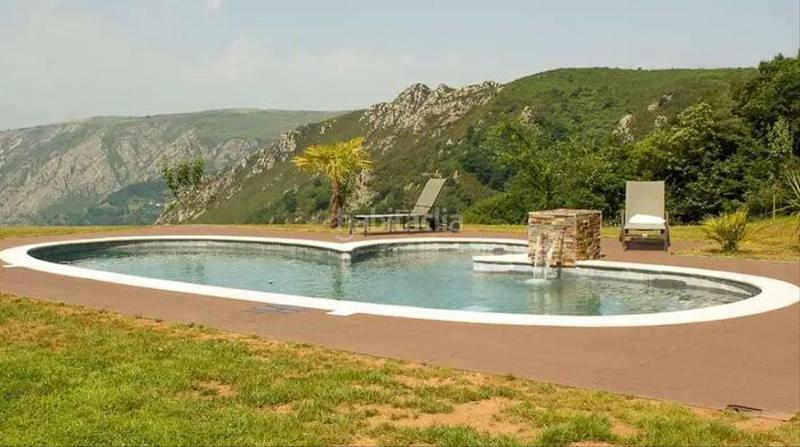 Foto f39188d4-a2ae-40b9-a52a-7c8d2d74a42b. Casale con camino parcheggio piscina in Salas