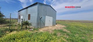 Masia a Dos Torres. Parcela rústica con nave en venta