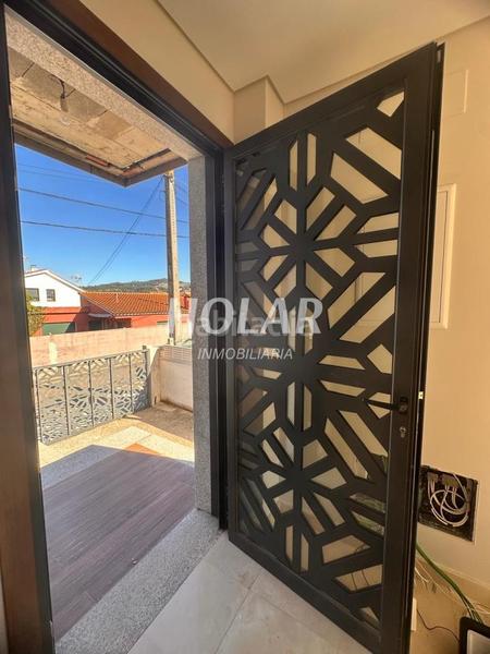 Foto ce6e7c91-d528-40c3-807b-184e30384392. Casa aparellada amb calefacció aparcament a Coruxo - Oia - Saiáns Vigo