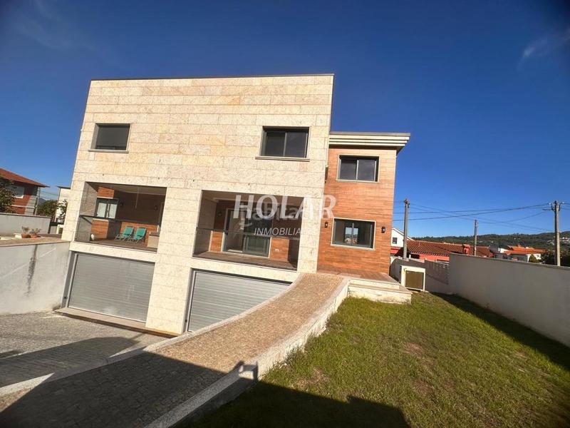 Foto 08af3d22-84fa-48ee-9748-f2cd4af36638. Doppelhaus mit heizung parking in Coruxo - Oia - Saiáns Vigo