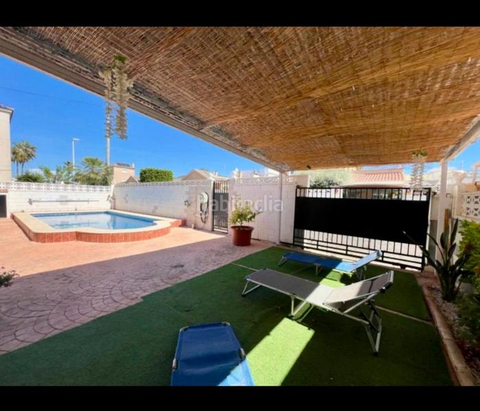 Foto 0a4a0a9e-e2be-43d4-b952-af604cc0bbe5. Location chalet avec cheminée parking piscine dans El Altet Elche / Elx