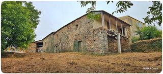 Casa a Avenida camilo josé cela 6. Casa con bosque en centro de triacastela