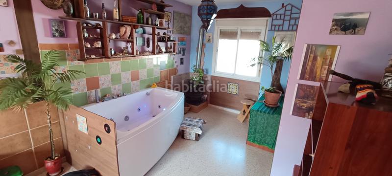 Foto ec16485f-916d-4bac-961b-14d0790c0d49. Casa adossada amb xemeneia a El Rocío - La Milagrosa Jerez de la Frontera