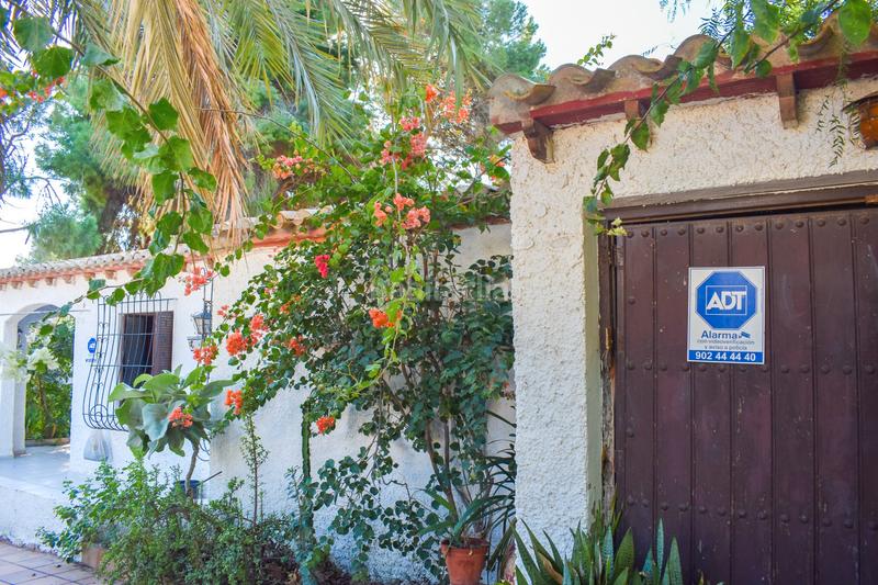 Foto ebfd9228-ca54-4e89-ab44-68448082a30e. Casa con parcheggio in Punta Prima Orihuela