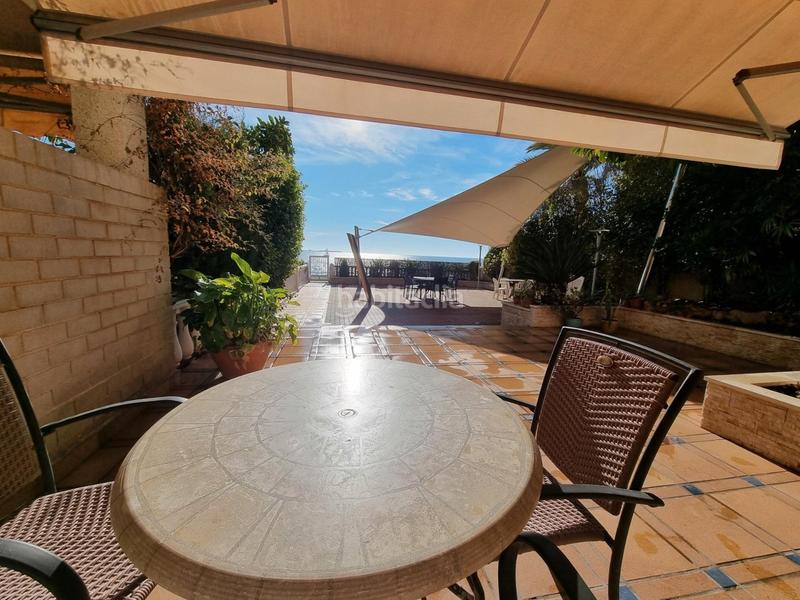 Foto b6945fb8-29d5-4457-b7bc-399aaa4aac11. Maison jumelée avec parking dans calas Santa Pola este Santa Pola