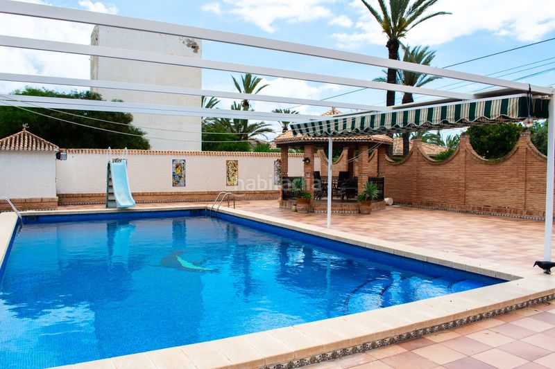 Foto f53b7a92-df20-4be6-a7a8-bddaad964b1e. Casa amb calefacció aparcament piscina a Cabo Roig Orihuela