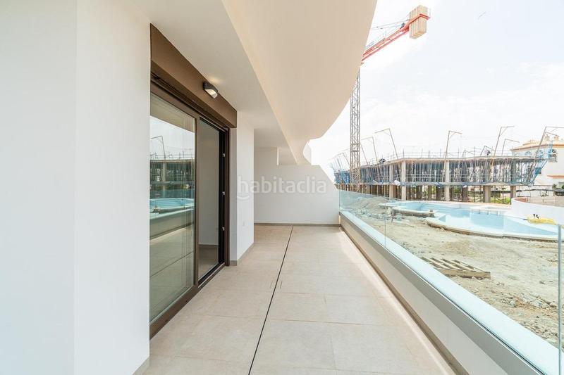 Foto 870e1bb0-4f93-4e22-a4e5-f48a354a872a. Appartement avec parking piscine dans Playa Flamenca Orihuela