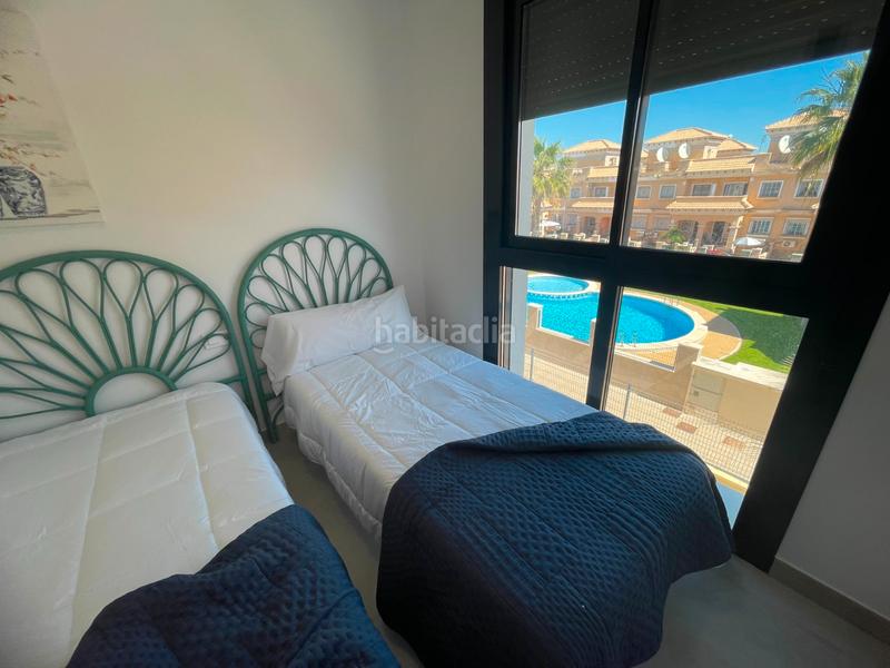 Foto 13329a5f-6a99-4c35-927c-3a068207978b. Casa sumérgete en el confort y la exclusividad de este sofisticado bungalow de obra nueva en la prestigiosa zona de pau 26, en Orihuela