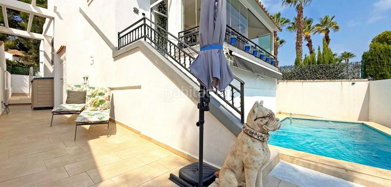 Foto 0d61e6bc-3ebd-4487-afd5-98c1b144fa9b. Casa descubra esta magnifica villa reformada en villamartin, donde la modernidad y la comodidad se fusionan en cada detalle. la propied en Orihuela