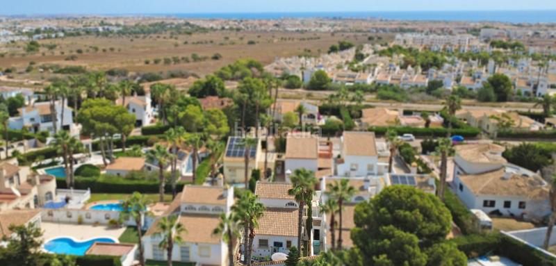 Foto 84a12d70-68da-4e91-a9bd-ac58e4b49cd0. Casa descubra esta magnifica villa reformada en villamartin, donde la modernidad y la comodidad se fusionan en cada detalle. la propied en Orihuela