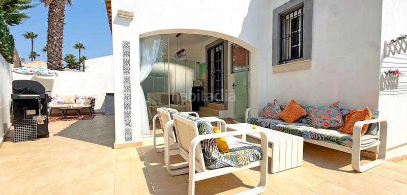 Foto dd38939d-38b1-49b6-b166-f7f864f8037a. Casa descubra esta magnifica villa reformada en villamartin, donde la modernidad y la comodidad se fusionan en cada detalle. la propied en Orihuela