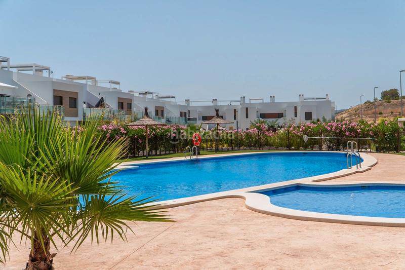 Foto 1b1c1dd7-90f1-4eb6-a3ca-8477e7d4f07b. Casa adosada le presentamos una magnífica oportunidad de adquirir ennbspresidencial de 4 exclusivos adosados en vistabella golf, costa en Orihuela
