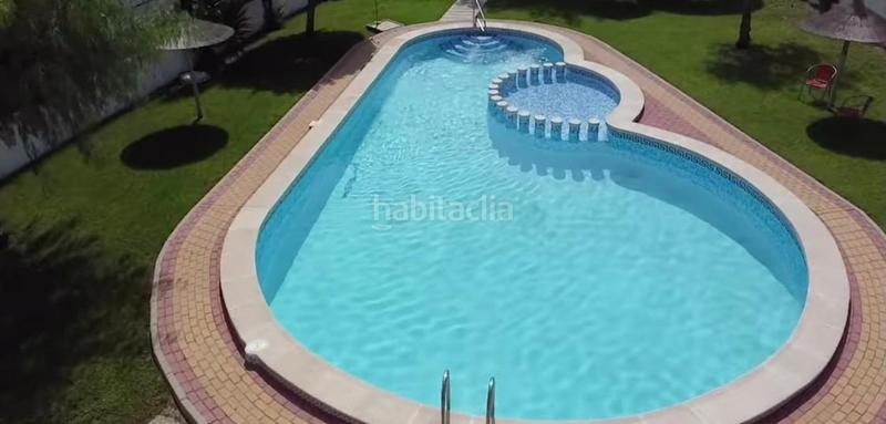 Foto 23512f7d-6fe8-4f48-913a-e7b62b75685e. Casa amb aparcament piscina a Los Almendros Orihuela