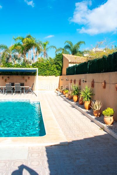 Foto 3180175c-1dfe-43e1-bf7e-a45ac3c4b703. Xalet amb aparcament piscina a La Zenia Orihuela