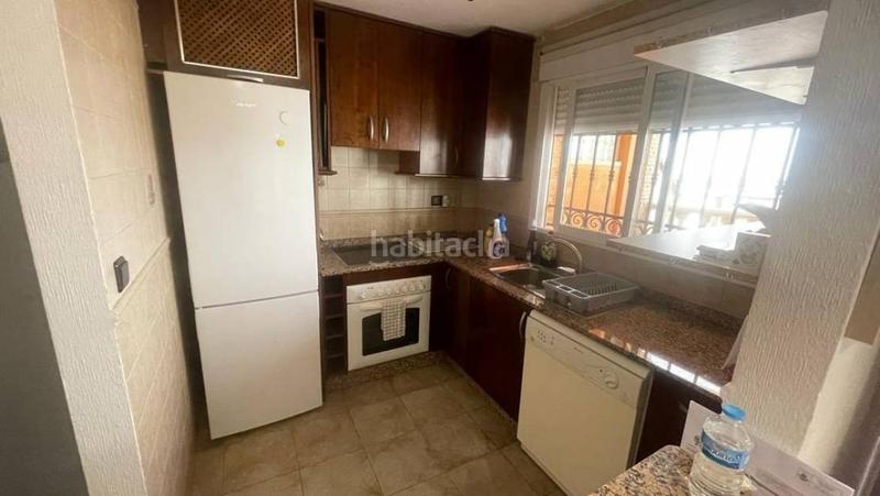 Foto 54475d9a-ac23-4040-a0f0-5f8b143b12ee. Casa adossada amb aparcament piscina a El Edén Guardamar del Segura